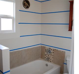 Dress up a bathroom wall with stripes