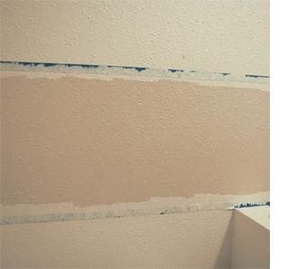 Dress up a bathroom wall with stripes