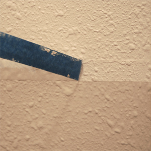 Dress up a bathroom wall with stripes