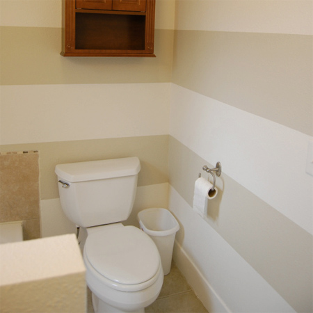 Dress up a bathroom wall with stripes