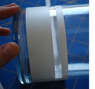 Etch a design onto a glass vase