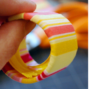 Make serviette rings from cardboard tubes