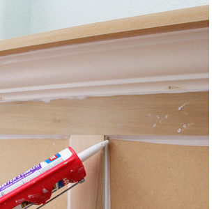 Build a fireplace surround with mantel shelf