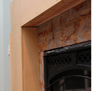 Build a fireplace surround with mantel shelf