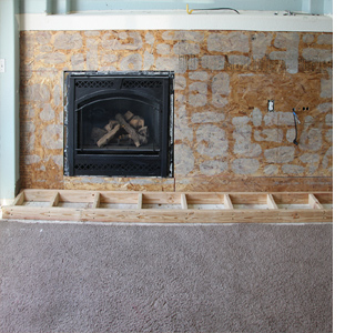 Build a fireplace surround with mantel shelf