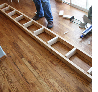 Build a fireplace surround with mantel shelf