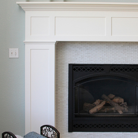 Build a fireplace surround with mantel shelf