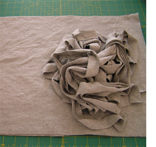 Decorative cushion with t-shirt scraps