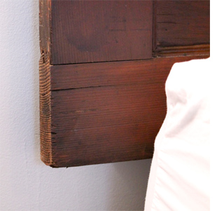 Make a headboard using a wooden door 