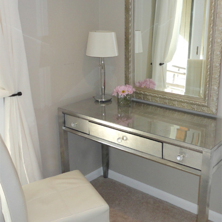 Dressing table with silver leaf finish