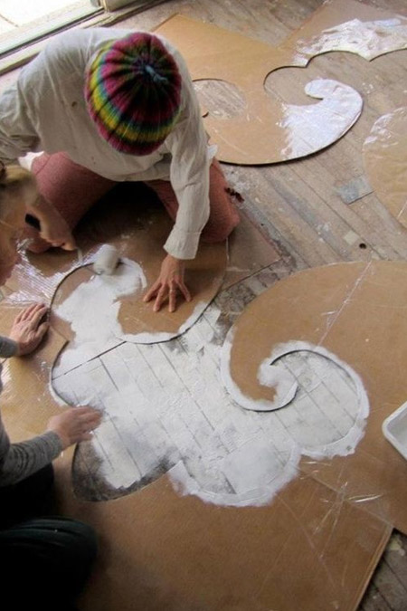 painting a wood floor with square tile design