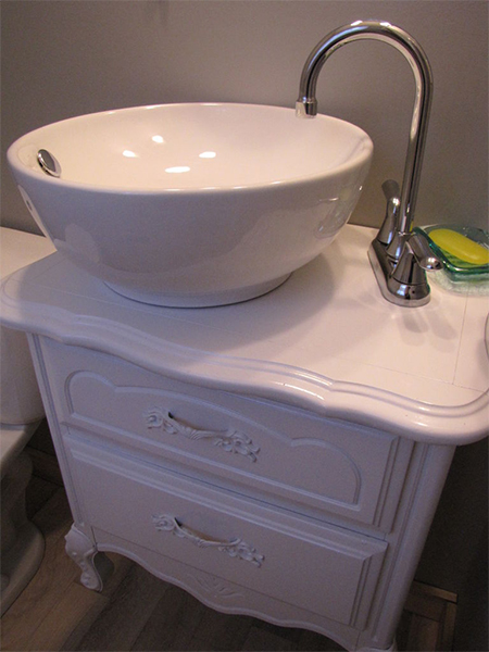 old vintage repurposed chest of drawers converted to bathroom vanity