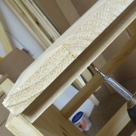 Secure with 40mm screws through the support and into the underside of the top.