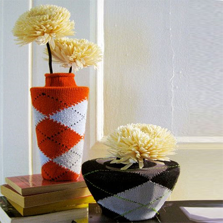 repurpose old socks as decorative covers for flower pots