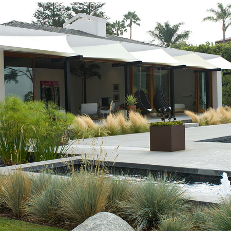 low maintenance garden soften concrete edges