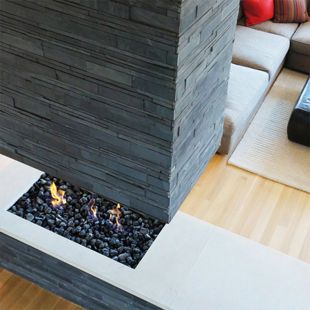 a house at home with the landscape central fireplace