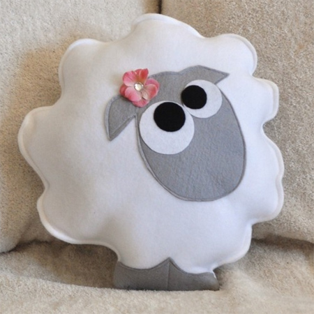 Decorate a gender-neutral nursery with a lamb or sheep theme