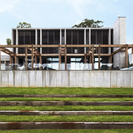 Concrete and wood make for beach house design