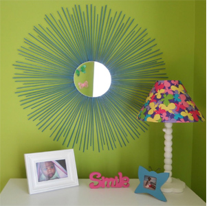 Affordable makeover for a little girl's bedroom sunburst mirror with skewers straws rolled paper