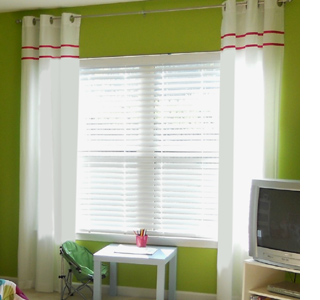 Affordable makeover for a little girl's bedroom add ribbon embellishment plain curtains
