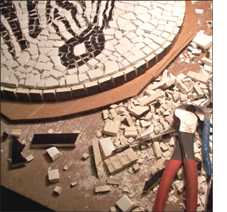 Use leftover tiles to make a mosaic tabletop zebra mosaic design