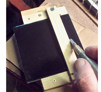 Use leftover tiles to make a mosaic tabletop