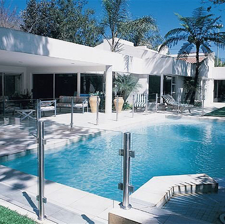 Glass pool enclosure sustainable design option for home interiors