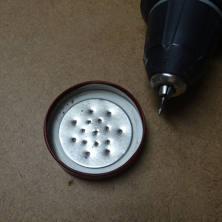 tins cans recycled into salt and pepper shakers drill holes in lid