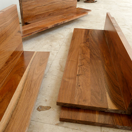 clad concrete staircase with wooden risers and steps