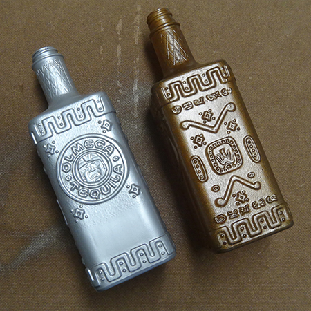 Rust-Oleum Universal titanium silver and aged copper spray paint to antique recycled bottles