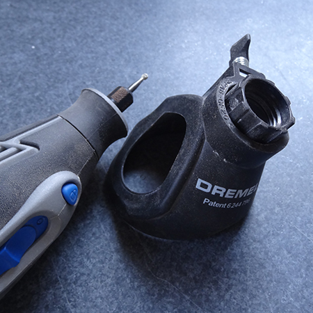 remove replace fix cracked broken or missing grout dremel multitool