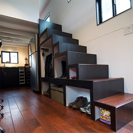 living off the grid in a small home that is battery and gas powered