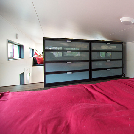 living off the grid in a small home that is battery and gas powered