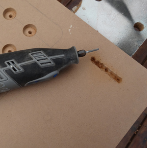 DIY laptop stand or laptop lap tray use dremel multitool to clean out slot