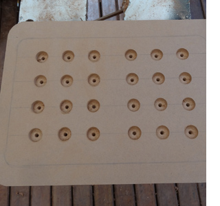 DIY laptop stand or laptop lap tray spade bit air circulation holes