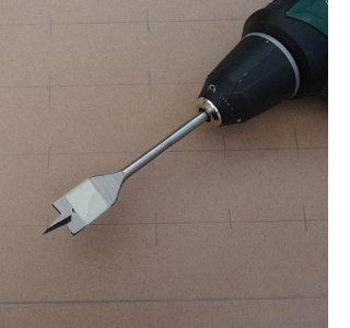 DIY laptop stand or laptop lap tray use a spade bit