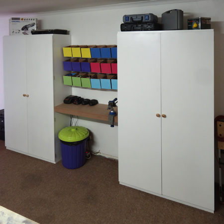storage cabinets to house all our tools and supplies with colourful storage bins