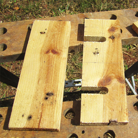 use spade bit to drill holes in reclaimed wood for mounting glasses