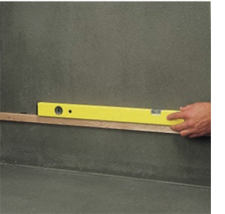 use length of timber batten and spirit level to ensure straight edge for tiling wall