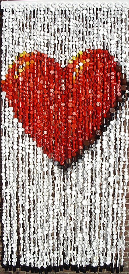 colourful curtain made from recycled plastic bottle tops caps