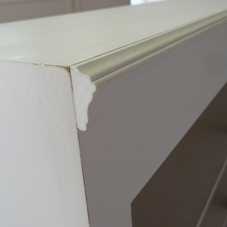 adding pine moulding to top of diy library bookcase bookshelf with ladder