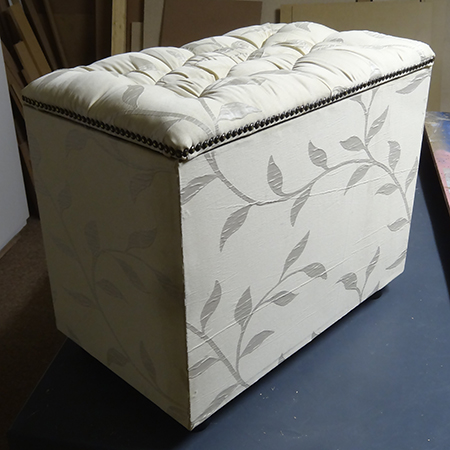 Cheat's diamond-tufted ottoman