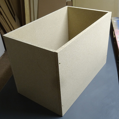 Cheat's diamond-tufted ottoman