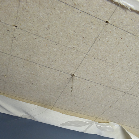 Cheat's diamond-tufted ottoman