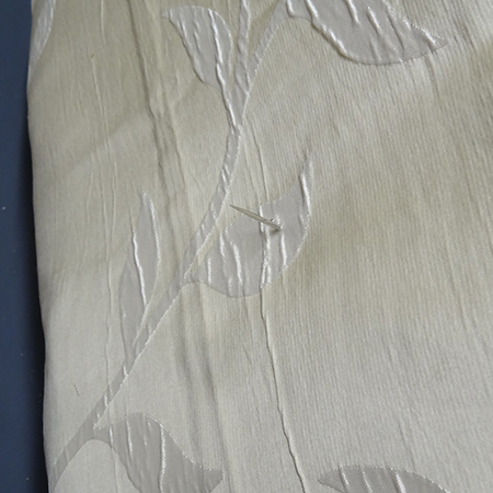 Cheat's diamond-tufted ottoman