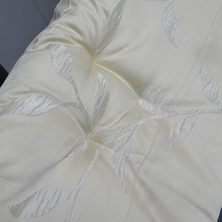 Cheat's diamond-tufted ottoman