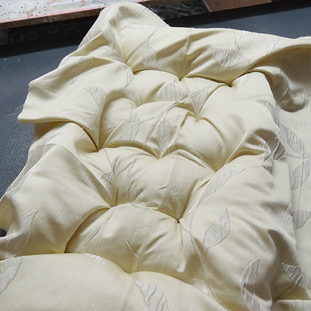 Cheat's diamond-tufted ottoman