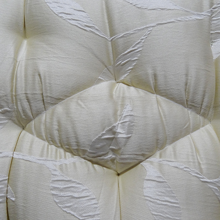 Cheat's diamond-tufted ottoman