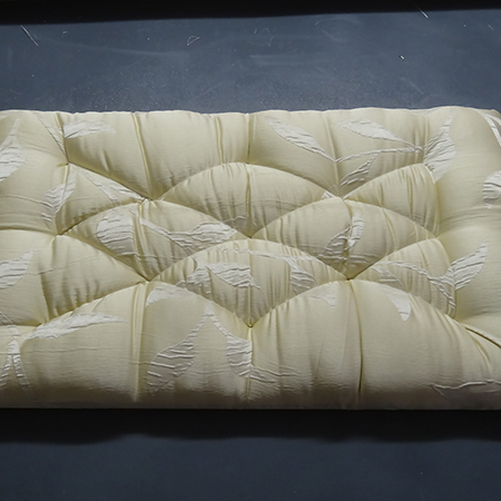 Cheat's diamond-tufted ottoman