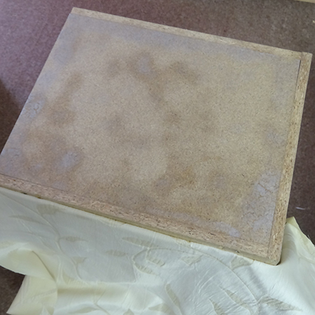 Cheat's diamond-tufted ottoman